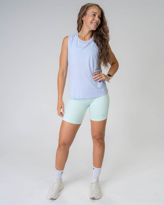 Flowy Scoop Hem Muscle Tank